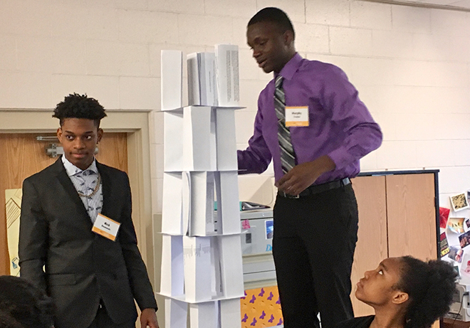 Academy students build a paper tower