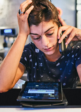 Small business owner reviews options for employee health plans
