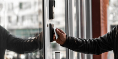 Employee using card to enter building
